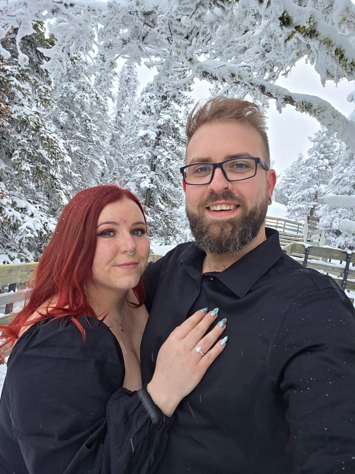 Olivia and Justin on Sulphur Mountain in Banff, newly engaged